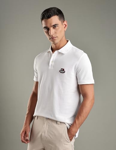 Image of Tommy Hilfiger Solid Regular-Fit Cotton Polo T-Shirt