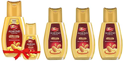 Image of Dabur Almond Hair Oil - 300ml (Pack of 3) + Almond Hair Oil 500ml with Almond Hair - 200ml|Damage Protection | Non Sticky Formula | For Soft & Shiny Hair | With Almonds,Soya Protein & Vitamin E