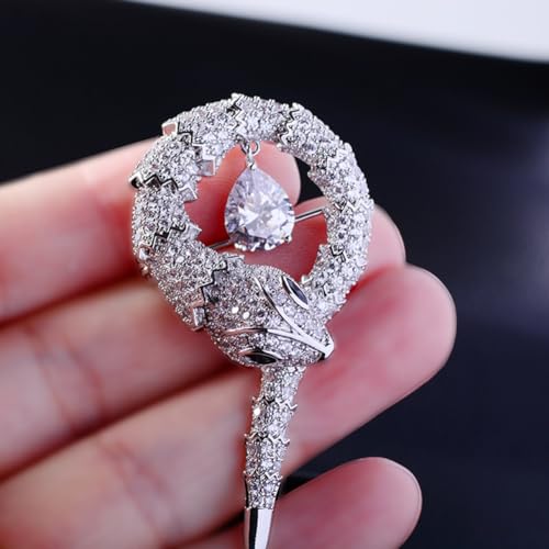 Broche serpent plaqué or et argent aux gros strass ciselés