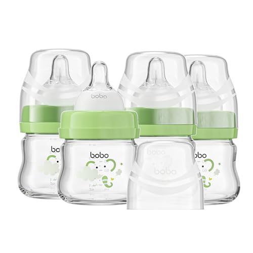 Image of YOHKOH Glass Baby Bottles with Slow Flow Nipple, Newborn Anti-Colic Baby Bottles for 0+ Months, Wide Neck Feeding Bottle, Clear (Green, 2.7oz (Pack of 4))