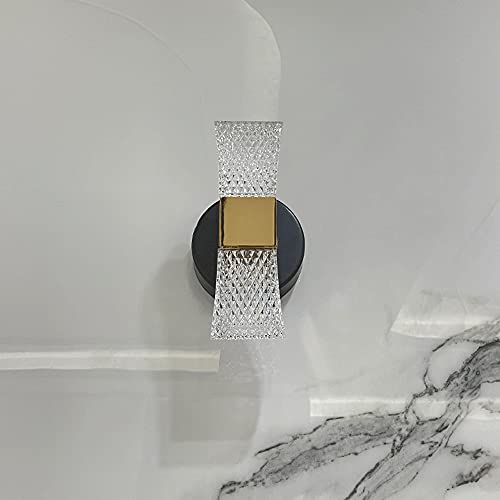 Lámpara de pared dorada para iluminar tu dormitorio con estilo 3