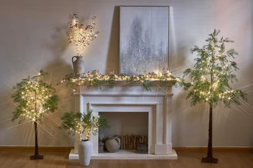 Décoration de Noël chaleureuse : branche lumineuse à baies rouges