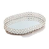 La bandeja de metal está hecha de metal pulido a mano y decorado con una superficie de cristal de espejo elegante, adecuada para decoraciones para el hogar.