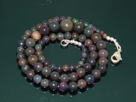 Opale Noire d'Éthiopie Welo en fil de perles lisses 3-9 mm pour création