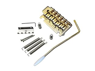 Patented eCAM saddle technology Z-Series single saddle lock screw design Individual string height adjustment Steel Babicz logo plate 2 1/16th String spacing