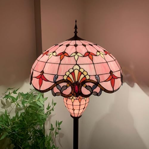 Double lit floor lamp on an elegant end table, showcasing warm ambient light and unique design.