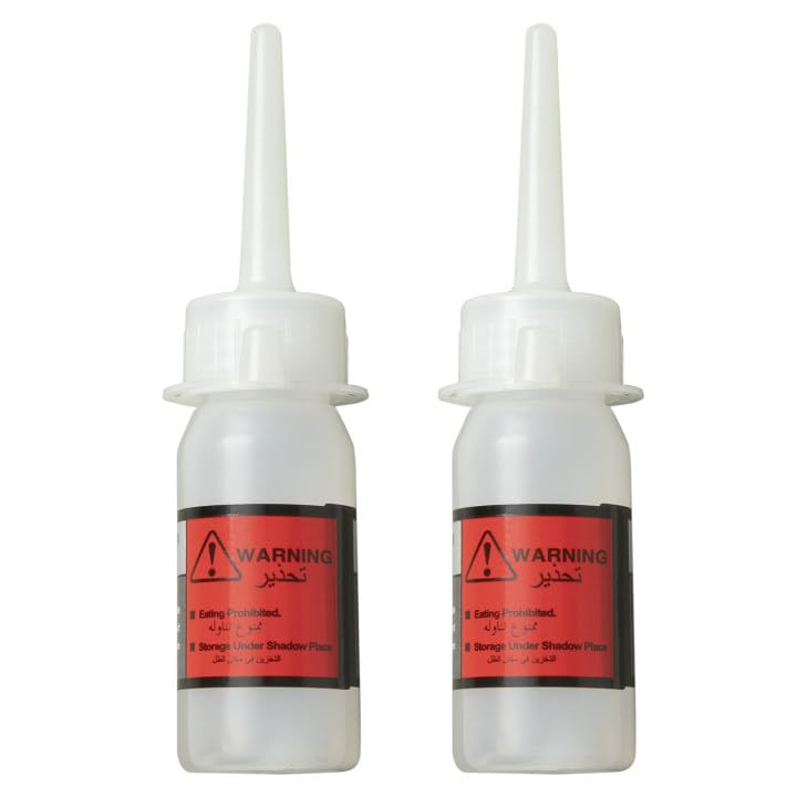 Two bottles of CURSOR FITNESS Silicone Oil Lubricant