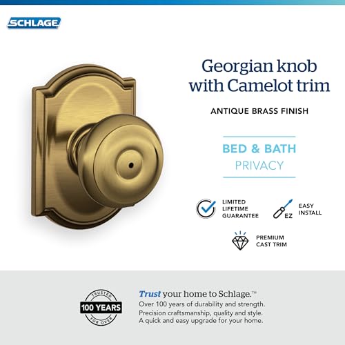 Image of SCHLAGE F40 GEO 609 CAM Camelot Collection Georgian Privacy Knob, Antique Brass
