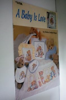 Paperback A baby is love: 15 designs Book