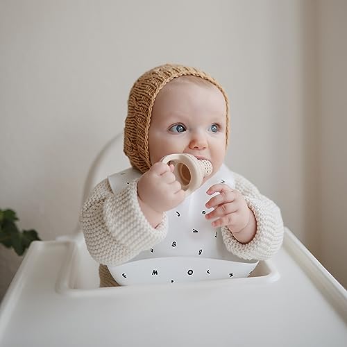Image of mushie Silicone Baby Bib | Adjustable Fit Waterproof Bibs (Letters White)