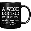 Panvola A Wise Doctor Once Wrote Dr Graduation Physician Surgeon Medical Student Graduate MD Practitioner Coffee Ceramic Mug Black 11oz