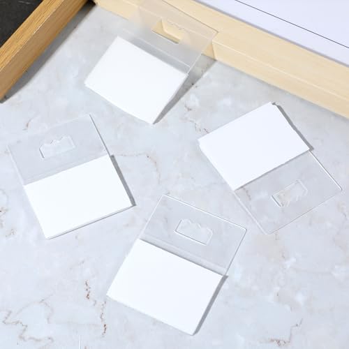 Image of 20Pcs Adhesive Picture Hanger, Foamboard Hanging Hooks Without Nails, Plastic Clear Sawtooth Picture Hangers for Back of Frames, Sticky Hangers for Poster Art Picture Photo Frame Bathroom