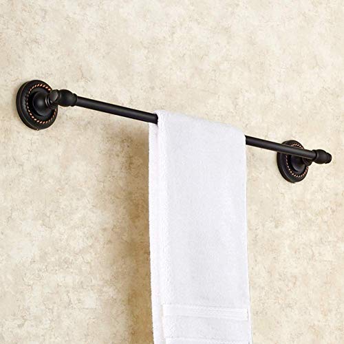 Porte-serviettes mural compact pour optimiser une petite salle de bain