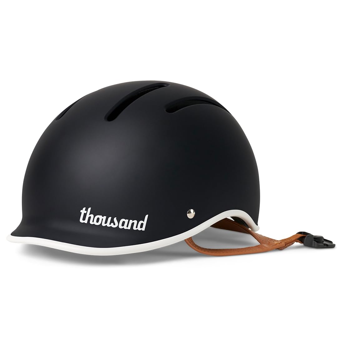 Casco Thousand para niños con pegatinas reflectantes y cierre magnético de seguridad 7