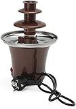 Creador de fondue calentado, algunos tipos de frutas y marshmallow se puede sumergir en chocolate para comer, o puede dejar que el chocolate congelado sobre frutas y marshmallow, luego comer