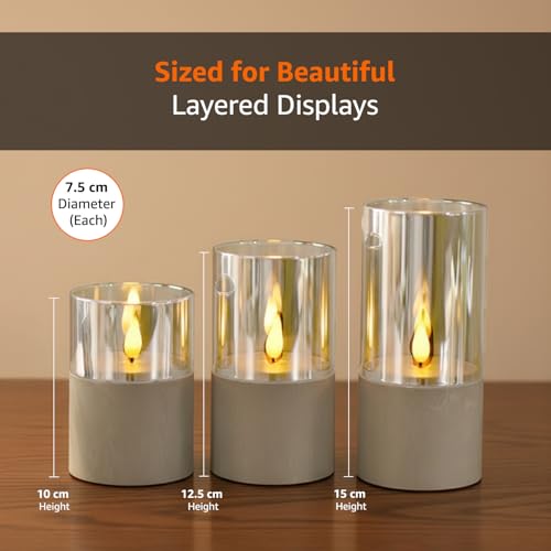 Image of amazon basics LED Pillar Candles, Set of 3 (7.5X10 CM, 7.5X12.5 CM, 7.5X15 CM), Clear Glass & Cement Base, Warm White Flickering Flame, Remote Controlled, Flameless Battery Operated Pillars