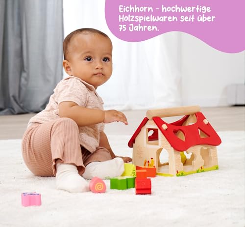Eichhorn 100002098 Holz Steckhaus, 15-teiliges Haus aus Kiefernholz, mit 12 Steck-Bausteinen, Motorikspielzeug für Kinder ab 1 Jahr, Größe: 18 x 17,5 x 18 cm