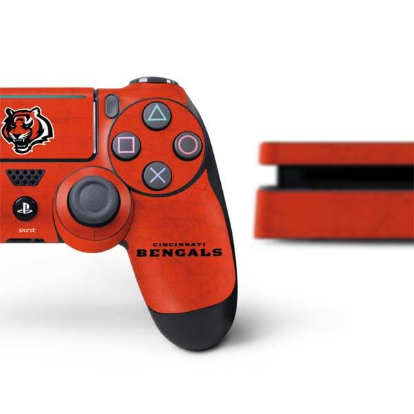 Skinit Decal Gaming Skin Compatible with PS4 Slim Bundle - Officially Licensed NFL Cincinnati Bengals - Alternate Distressed Design