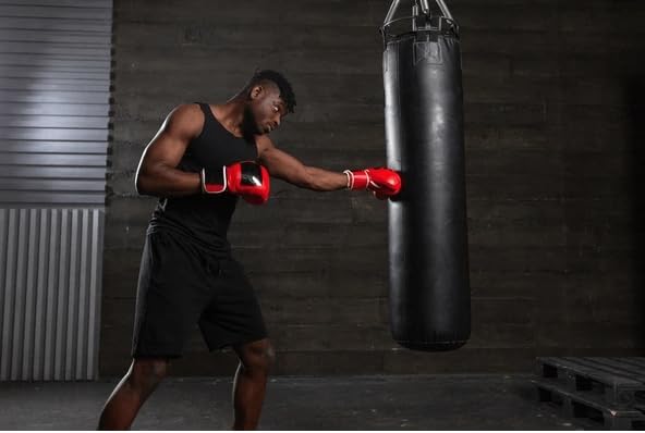 Image of Punching Bag for Home Heavy Duty Boxing Punching Bag with Stainless Steel Hanging Chain 2Feet Unfilled Synthetic Leather and Hand Wrap for (MMA,Kickboxing,Muay Thai,Taekwondo,Judo,Karate). Black
