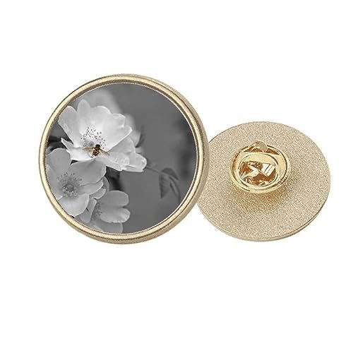 Broche ronde dorée fleur noire et blanche taille M accessoire bijou pour manteau et veste