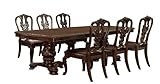 Set Includes: (1) Dining Table and (6) Side Chair; Finish: Brown Cherry; Fabric Color: Dark Brown Features geometric design table top with elegant rope design apron; Double pedestal design with intricate carvings (2) 18-inch expandable leaves; Leathe...