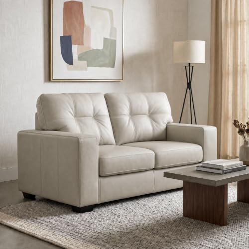 Image of Signature Design by Ashley Santorine Leather Match Loveseat, Bone Beige | Top-grain leather seating, Medium plush firmness, 62-in wide frame, Engineered wood construction, 118 lbs