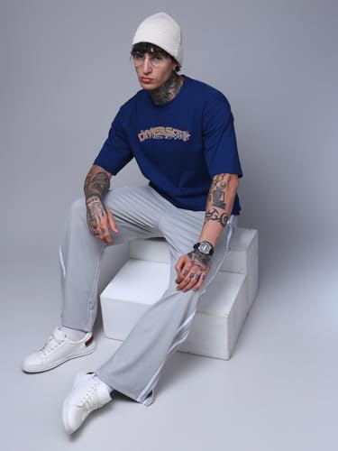 Image of Men's Loose Fit Side Tape Trackpants