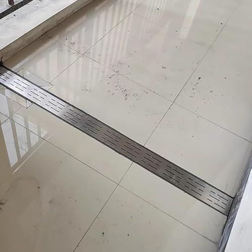 Drenaje de zanja con cubierta para evitar charcos en la entrada de patio de hormigón 2