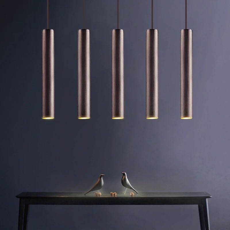 Lampe à suspension tube long dorée pour supprimer les zones d'ombre sur votre îlot de cuisine