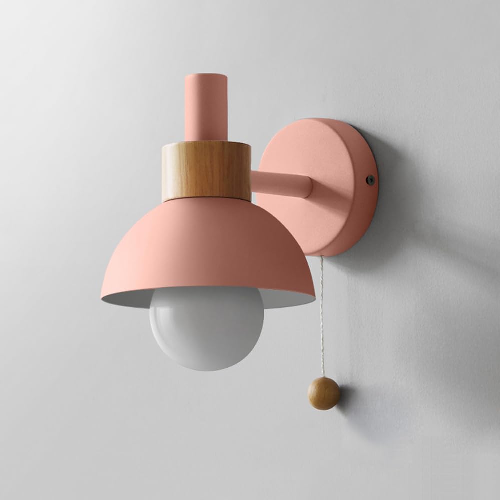Lámpara de pared junto a la cama para leer sin ocupar espacio en la mesita