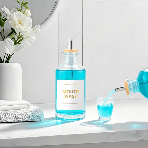 Image of Glass Mouthwash Dispenser for Bathroom 11.8OZ, Clear Refillable Mouthwash Container with Glass Mouthwash Cup, Bamboo Tray and Golden Sticker, Stainless Steel Pour Spout and Funnel