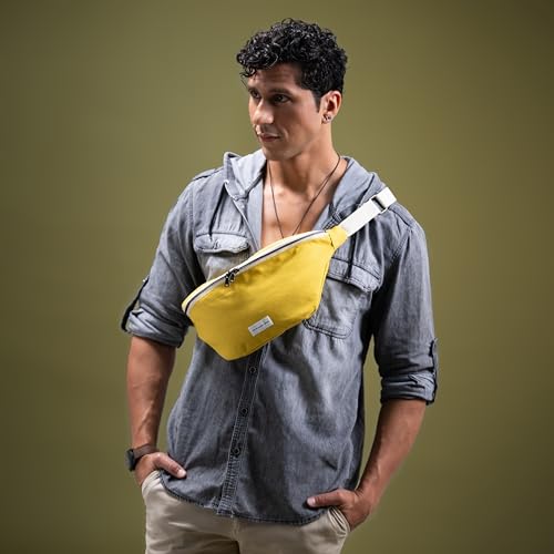 Image of The Peacock Crew Canvas Crossbody Sling Bag for Men & Women - Adjustable Strap, Dual Zippers Left /Right Handed, Secure Everyday Travel Fanny Pack Shoulder Pouch, Trekker Yellow Gold, 14.5 x 6.3 x 3.6