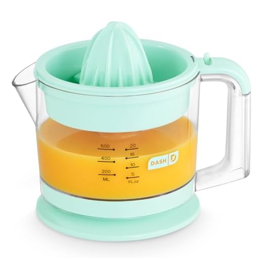 Dash Citrus Juicer Extractor: Compact Juicer for Healthy Juice, Oranges, Lemons, Limes, Grapefruit & other Citrus Fruit with Easy Pour Spout + 32 oz Pitcher - Aqua