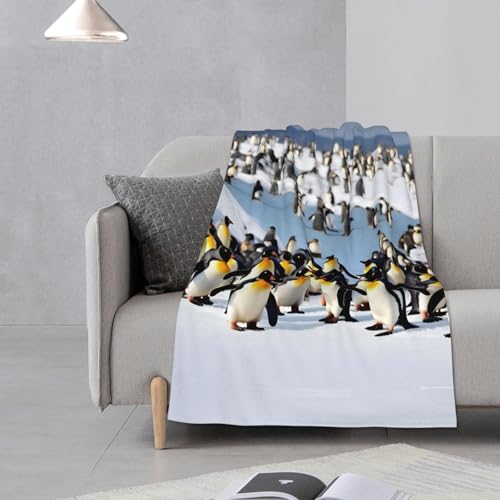 Couverture flanelle pingouin contre le froid du lit et canapé