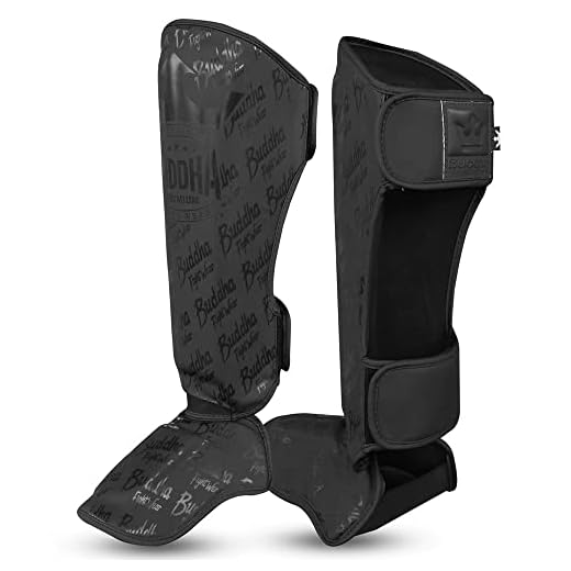 BUDDHA FIGHT WEAR - Espinilleras Muay Thai, MMA y Kick Boxing Modelo Epic - Fabricadas en Piel Sintética de Última Generación - Costuras más Resistentes y reforzadas - Color Negro Mate - Talla L
