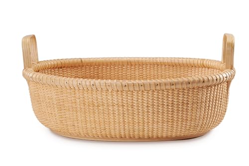 Nantucket-style basket Cane-on-cane weave Handles...