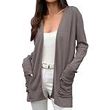 Doté de poches pratiques, ce cardigan pure laine offre une touche fonctionnelle tout en restant stylé et polyvalent