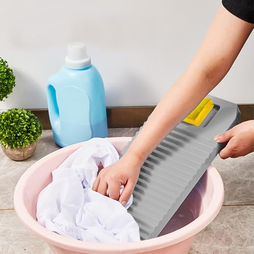 Brosse à linge et planche à laver antique pour enlever les taches