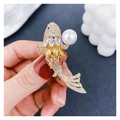 Broche poisson pour pull en maille idéale lors d'un rendez-vous professionnel