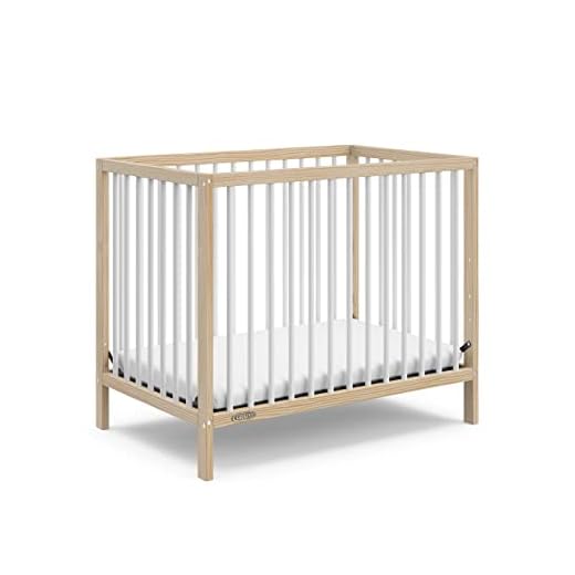 Graco Teddi 4-in-1 Convertible Mini Crib with Bonus Water-Resistant Mattress (Natural with White) – GREENGUARD Gold Certified, 2.75-Inch Mattress Included, Convenient Size, Easy 30-Minute Assembly