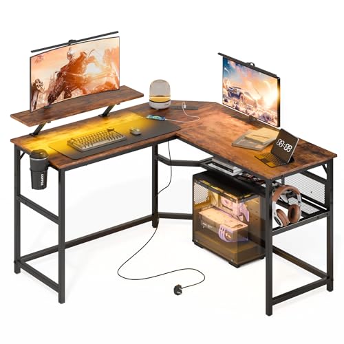 Mondeer Gaming Tisch L Form mit LED, 130 x 130 cm Eckschreibtisch mit 2 USB Ladeanschluss und 2 Steckdosen, Reversibler Schreibtisch mit Regal & Monitorständer, für Heimbüro Schlafzimmer, Braun