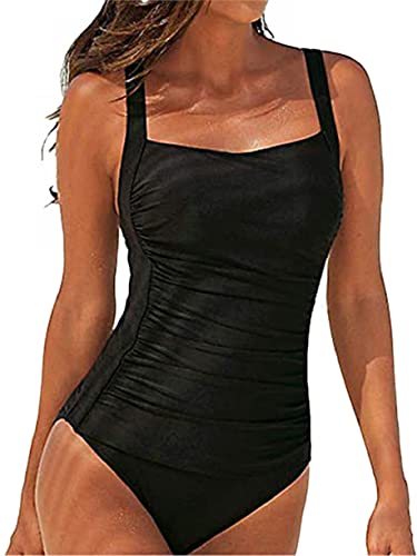 Mujer luciendo un bañador negro de una pieza que oculta la barriga, estilo vintage con cuello cuadrado
