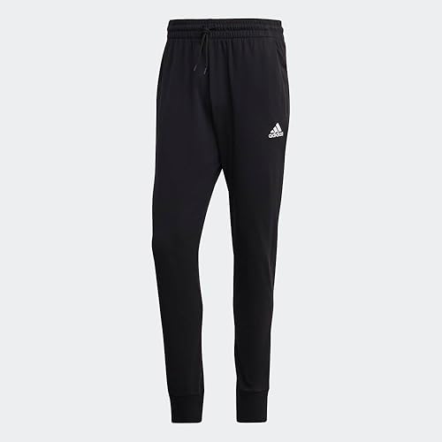Miniatura 5 de adidas Pantalones Essentials de punto único con puños cónicos para hombre