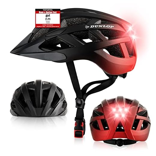 Dunlop Sports Fahrradhelm mit Licht - Sofort gesehen Werden - Ultraleichter Spezial Damen Herren Kinder Fahrrad Helm Visier und Rücklicht für hohe Sicherheit - Urban (Schwarz/Rot, S (52-56 cm))