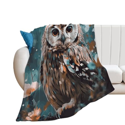 Couverture microfibre hibou pour des soirées cocooning sur le canapé
