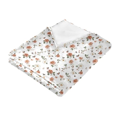 Plaid canapé rose et blanc idéal pour vos soirées