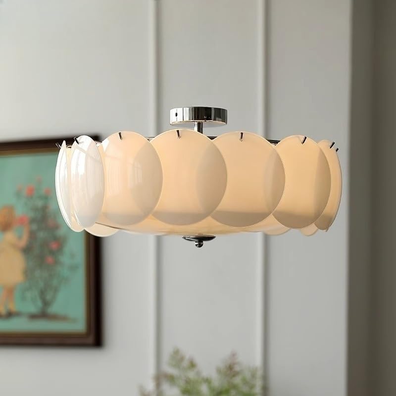 Plafonnier rond en verre contre le manque de clarté en chambre moderne