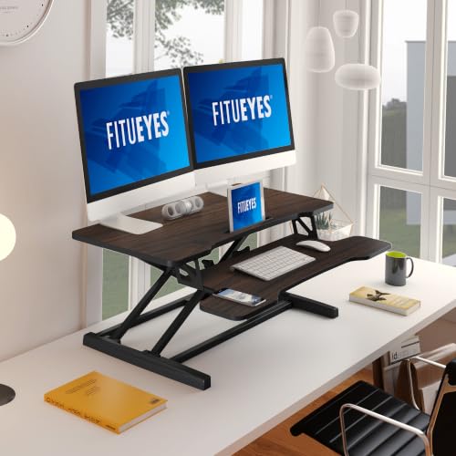 Image of FITUEYES Height Adjustable Standing Desk 36 inch Wide Sit to Stand Converter Stand Up Desk Tabletop Workstation for Laptops Dual Monitor Riser Brown SD309102WE