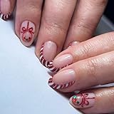 Christmas Press-on Short Oval Nude Fake Nails for Women & Girls - 24 Pcs with Stars, Glitter Designs, Dent Force Glossy Full Cover Glue-on Nails: Cute Stars, Candy, Xmas Acrylic Nails