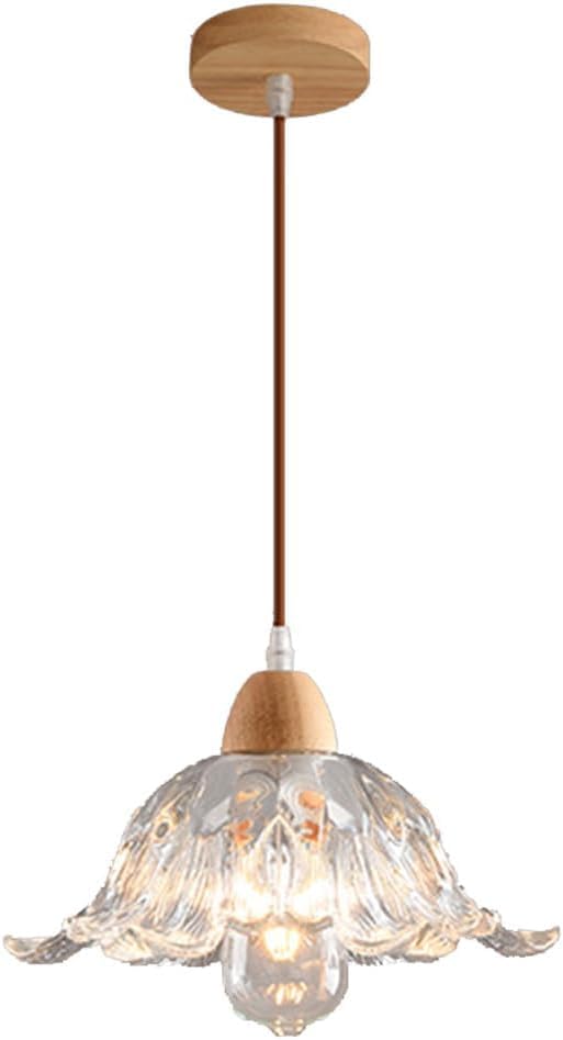 Lustre en verre moderne pour illuminer un îlot de cuisine sombre avec élégance